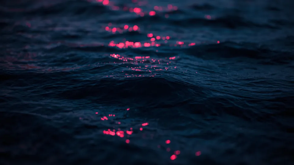 ocean waves with night reflections